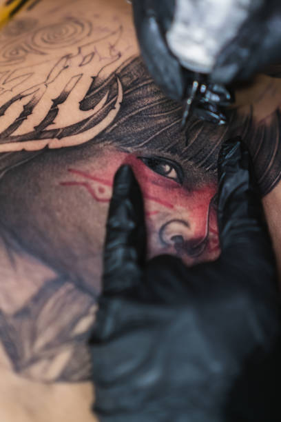 istock Skin level tattoo in whip shading technique, black and red ink 1468678537