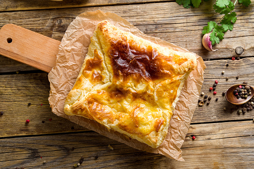 khachapuri layered with cheese georgian kitchen on old wooden table top view