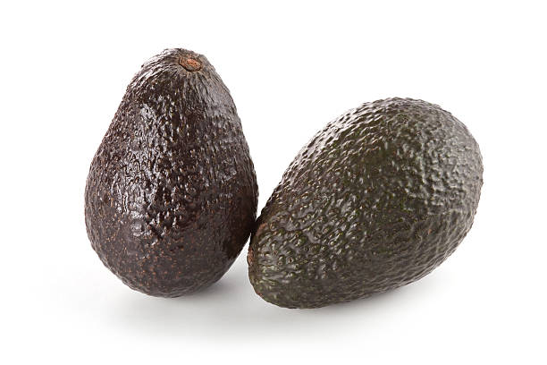 Two Hass Avocados stock photo