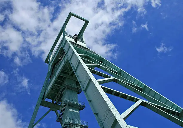 Low angle view of the 68 m. high winding tower of the German Mining Museum. Bochum, Germany.