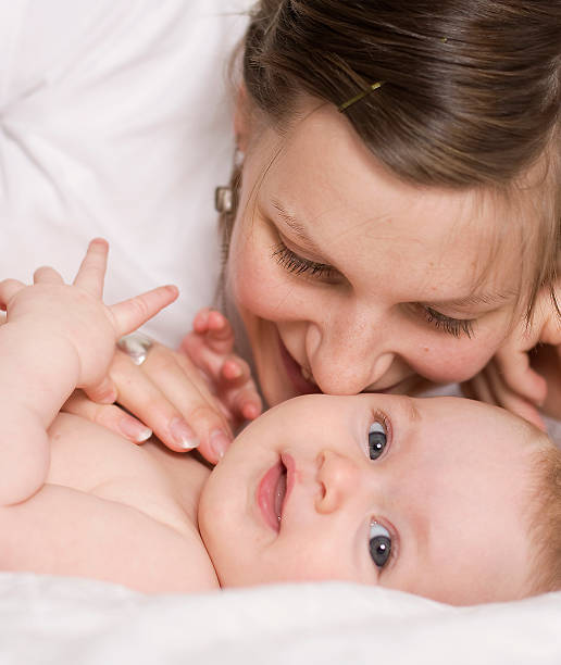 Happy mom and baby. stock photo