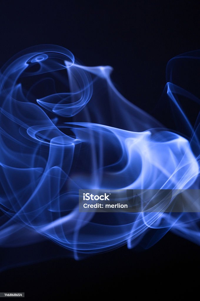 Blue smoke abstract Blue vibrant smoke on black background. Abstract Stock Photo