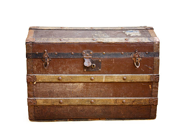 istock Antique travel trunk with rusty locks over white 146869583