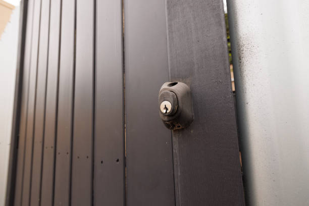 istock Close-up of a lock on a wooden gate 1468696232