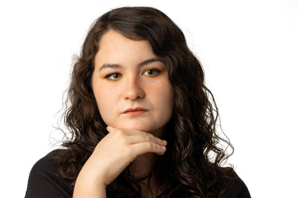 istock Beautiful woman deep in thought on white background 1468717211