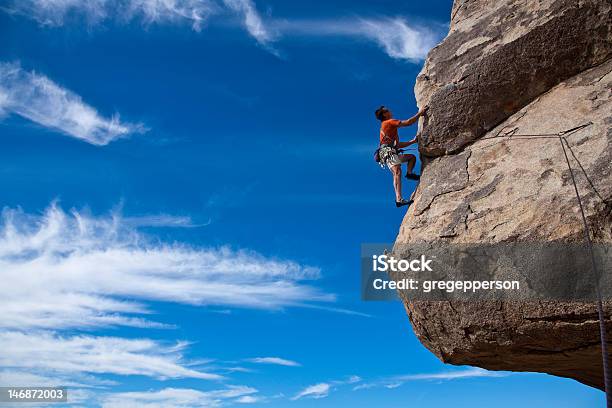 Climber Clinging To The Edge Stock Photo - Download Image Now - Rock Climbing, Mountain Climbing, In Silhouette