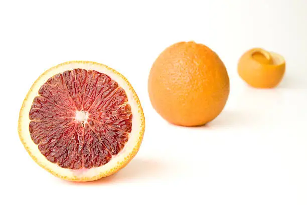 Fresh Whole and sectioned blood oranges
