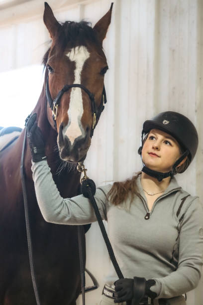 istock Girl looking at Horse 1468720941