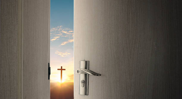 istock Gate to heaven on cross sunset background 1468721869