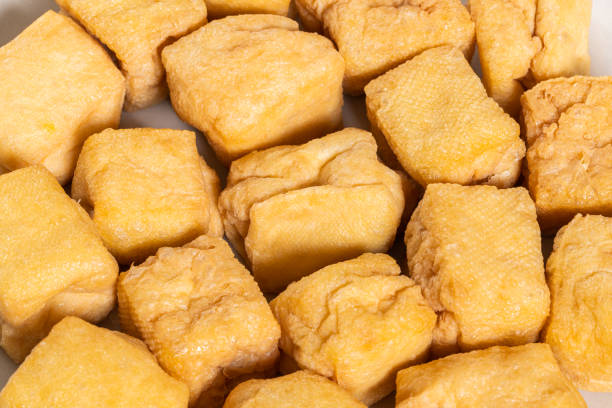 istock Fried tofu isolated on white background 1468722570