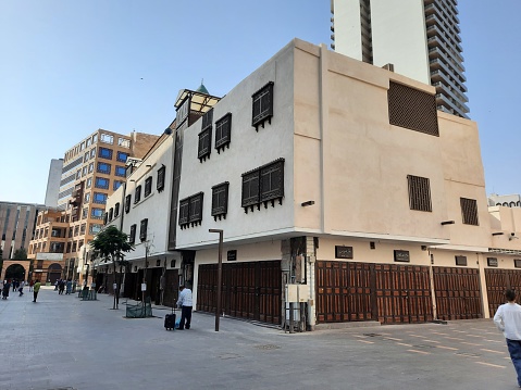 A view of the old and historical part of the city of Jeddah, Saudi Arabia.  These buildings are located in Balad area of ​​Jeddah. The area in which Jeddah's ancient buildings are located has been declared a heritage site by the Saudi government.