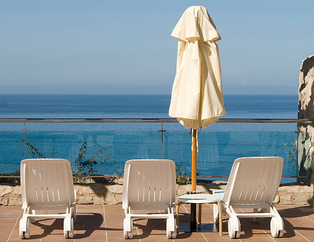 istock hammocks near the seaside with umbrella 146872504