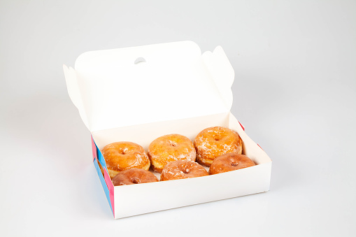 Glazed donuts in box unbranded packaging template mock up