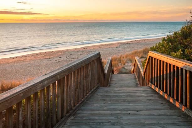 istock Christies Beach boardwalk at sunset 1468730858