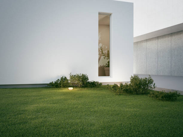 istock House with concrete terrace near empty grass floor. 1468733355