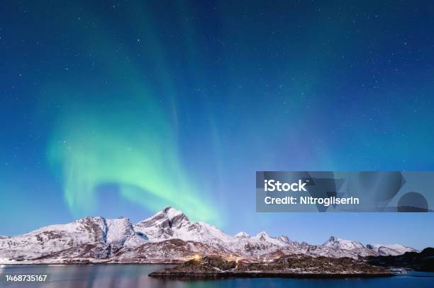 Northern Lights In Winter Landscape Stock Photo - Download Image Now - Astronomy, Atmospheric Mood, Aurora Borealis