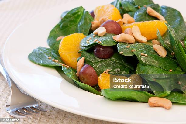 Spinach And Mandarin Orange Salad Stock Photo - Download Image Now - Cashew, Dinner, Food