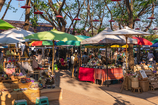 February 11, 2023: Jing Jai market, a lively weekend market supplying organic fruit and vegetable, coffee and food, located in chiang mai, thailand. It takes place in the morning every weekend.