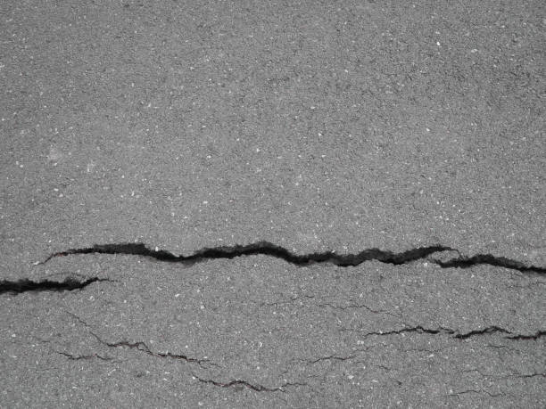istock Road damaged by earthquake disaster 1468742376