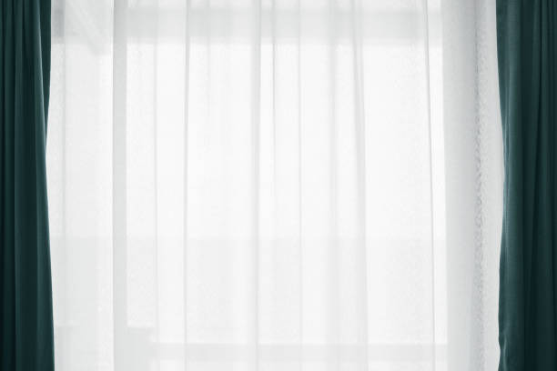Cтоковое фото Мягкий свет через белую занавеску