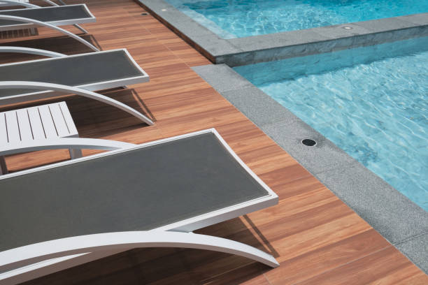 istock Swimming pool with loungers 1468742470