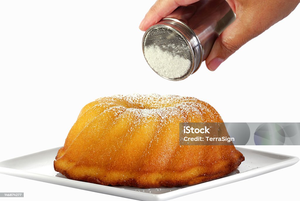 cake with confectioners sugar isolated cake with confectioners sugar Cake Stock Photo