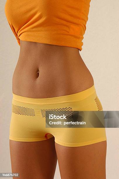 Lifestyle Stomach Stock Photo - Download Image Now - Active Lifestyle, Adult, Cycling Shorts