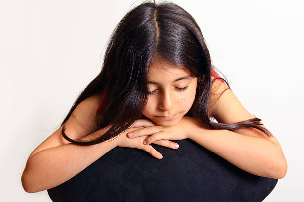 Young girl in red dress stock photo