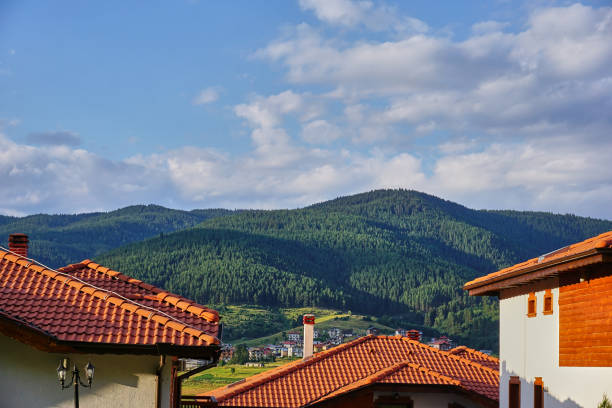 istock Mountain village behind the roofs 1468749794