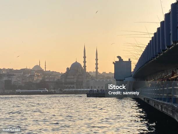 Turkey Istanbul Galata Bridge With Fisherman And Yeni Cami Mosque Stock Photo - Download Image Now