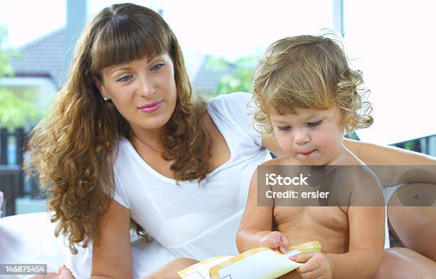 Getting Busy Stock Photo - Download Image Now - Adult, Baby - Human Age, Beautiful People