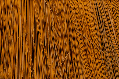 Closeup of thatched roof. Tropical roofing on beach