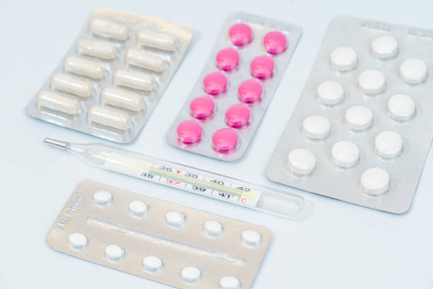 istock Capsules pills and tablets in blister packaging. Isolated 1468757373