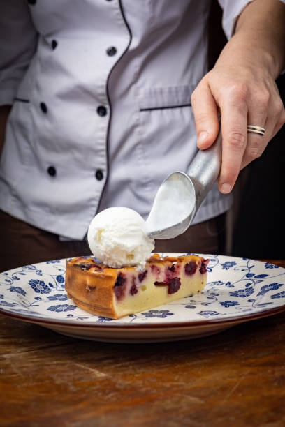 istock piece of cheesecake with cream and chocolate on a white plate 1468762468