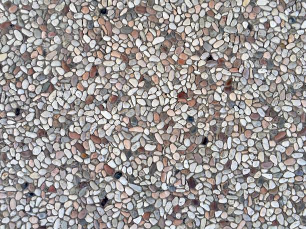 full frame abstract background of natural stones on the wall