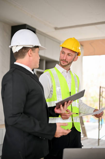 istock Caucasian male construction engineer manager discussing with a businessman 1468767738