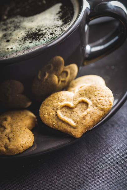 istock Sweet gingerbread hearts and coffee cup. 1468770369
