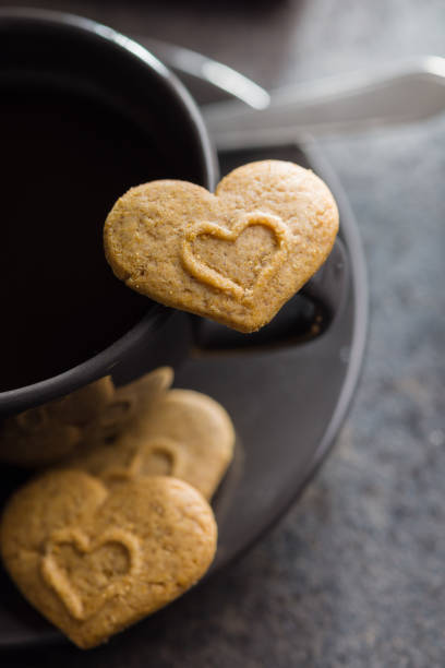 istock Sweet gingerbread hearts and coffee cup. 1468770371
