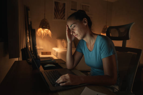 istock Woman suffers headache from excessive screen time 1468776054