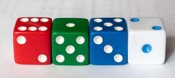 istock Four dice of different colors 1468782652