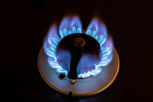 istock Gas stove burner with blue flame 1468784721
