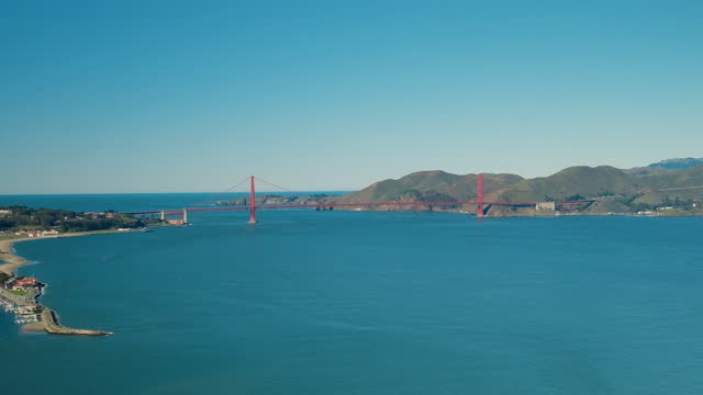AERIAL Beautiful Golden Gate Bridge in San Francisco, California on a sunny day