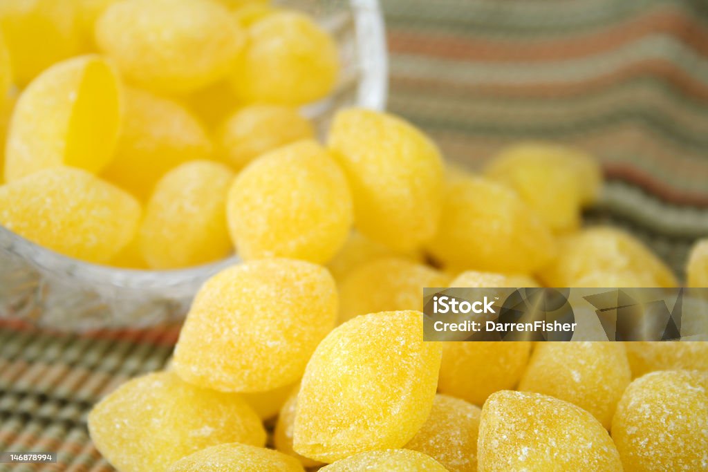 Lemon Drops Close up with selective focus of old fashion lemon drops. Candy Stock Photo