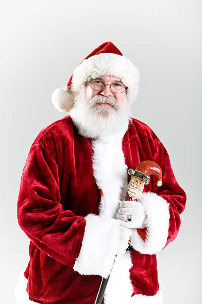 istock Santa Claus close up with cane on white background 146879224