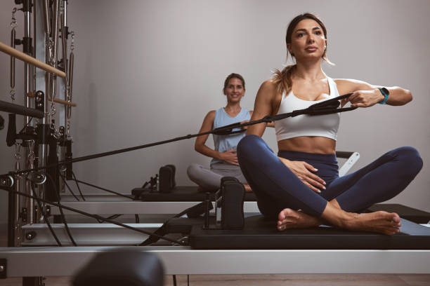 istock Young women exercising in a gym. 1468794013