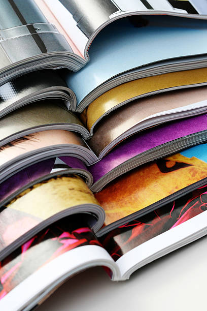 istock Bindings of open magazines stacked on top of each other 146879999