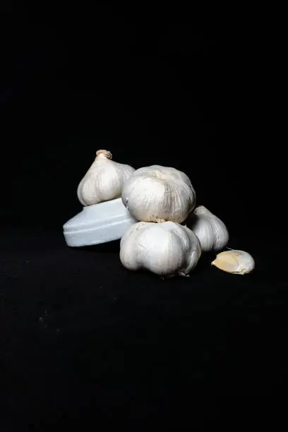 white garlic with black background, food and seasoning, garlic