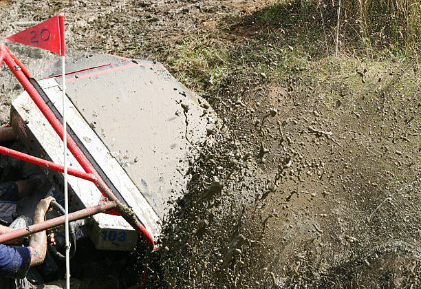 istock Off road vehicle splashing into the mud 146880420