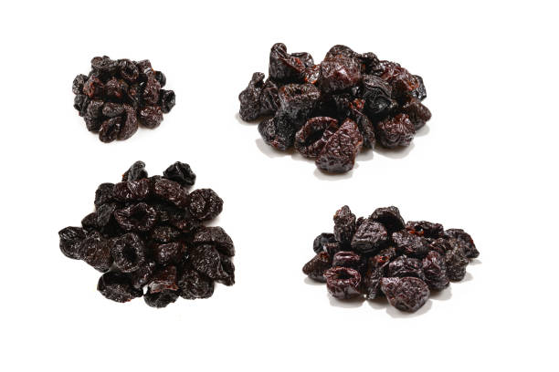 istock Dried plum isolated on white background 1468811340