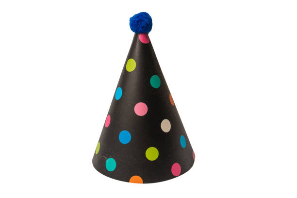 istock Bright and colorful birthday cap isolated on a white background. 1468811380